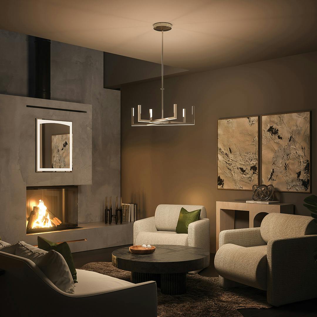 Night time Living Room with Priam LED Chandelier Polished Nickel