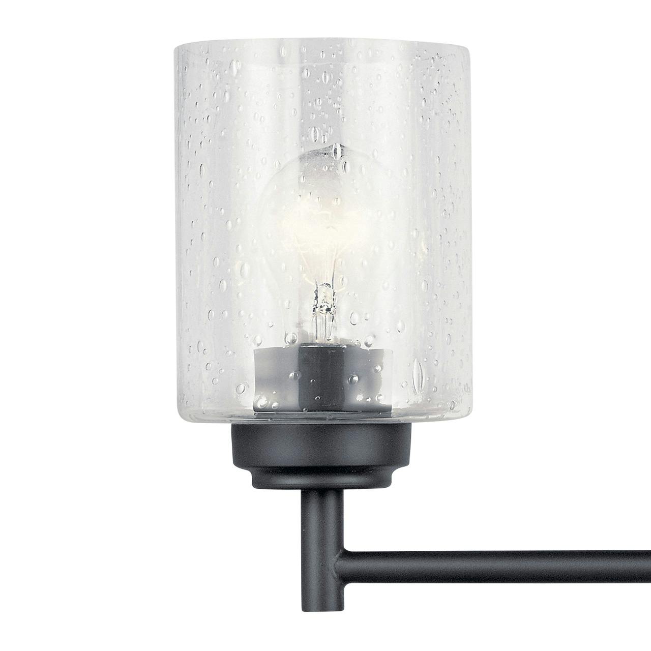 Close up view of the Winslow 4 Light Vanity Light Black on a white background