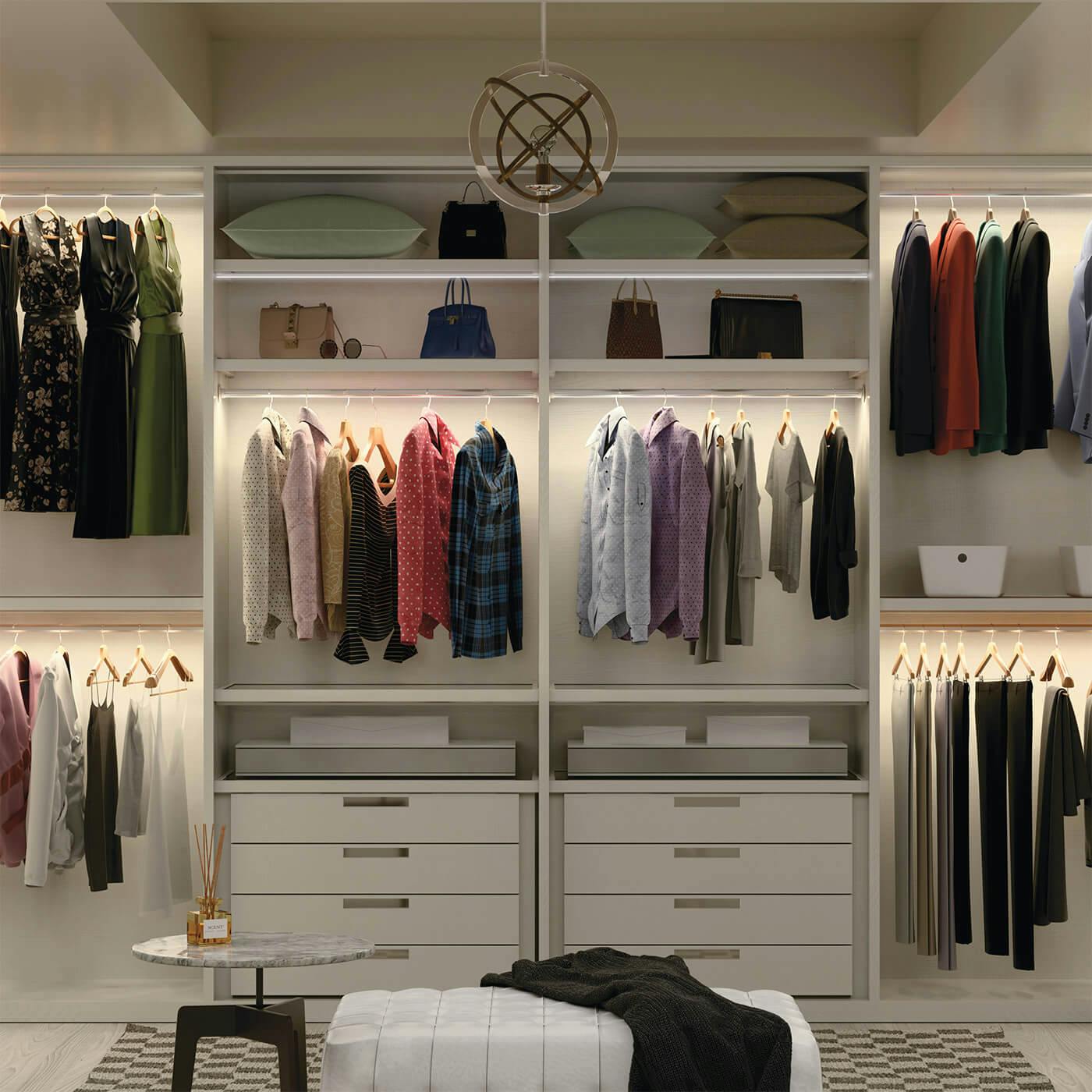 Closet with mini chandelier that is off while downlights are lit up