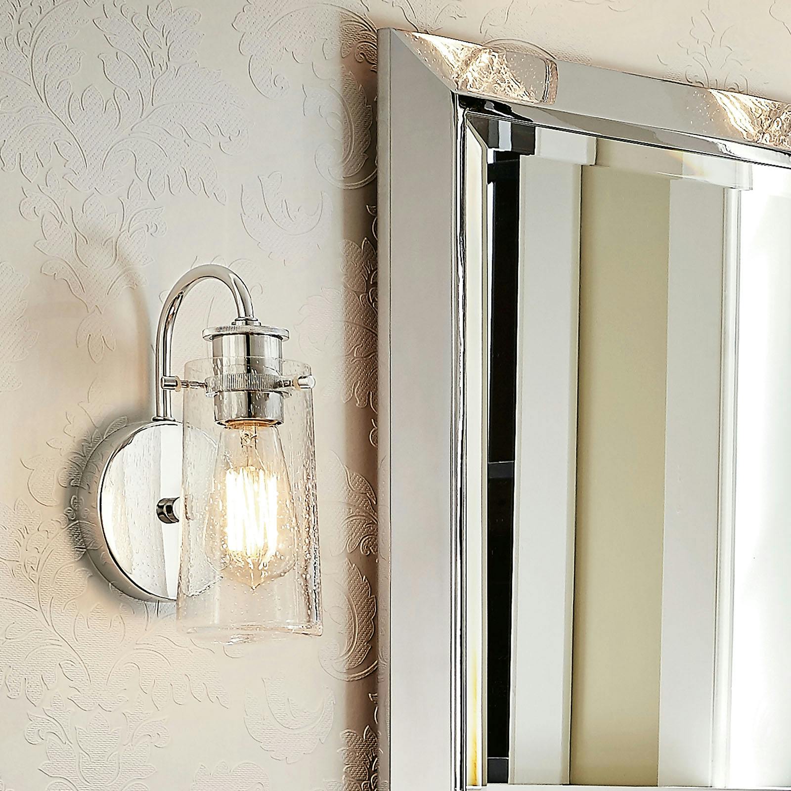 Close up view of the Braelyn™ 9.5" 1 Light Wall Sconce Chrome on a white background