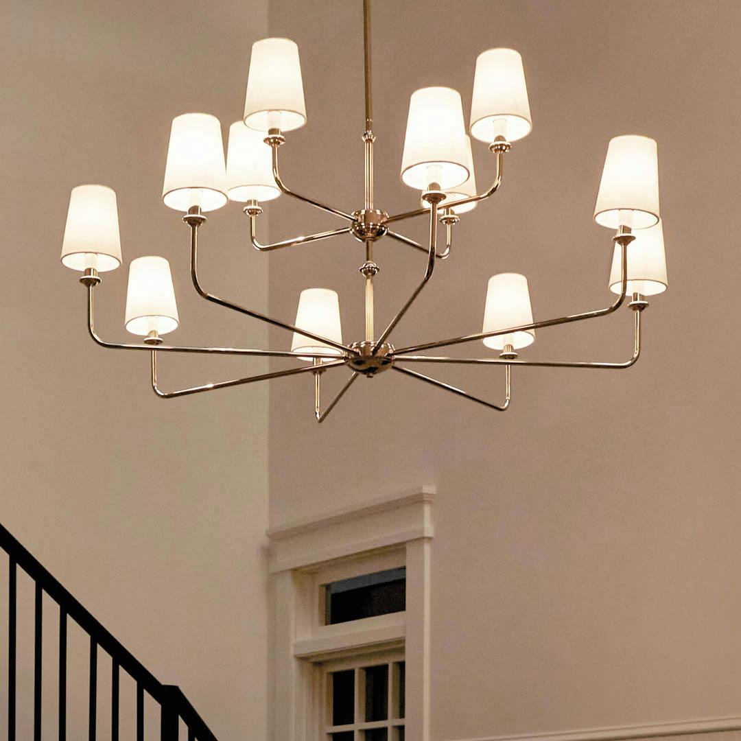 Night time foyer with Pallas 42.75" 12 Light Chandelier Polished Nickel