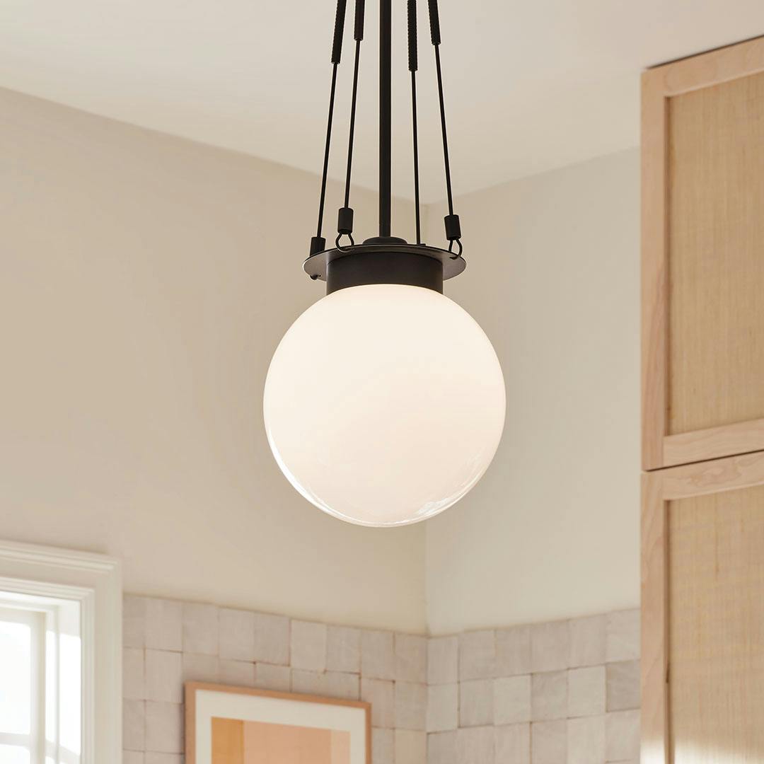 Day time kitchen with the Albers 10.5 Inch 1 Light Pendant with Opal Glass in Black