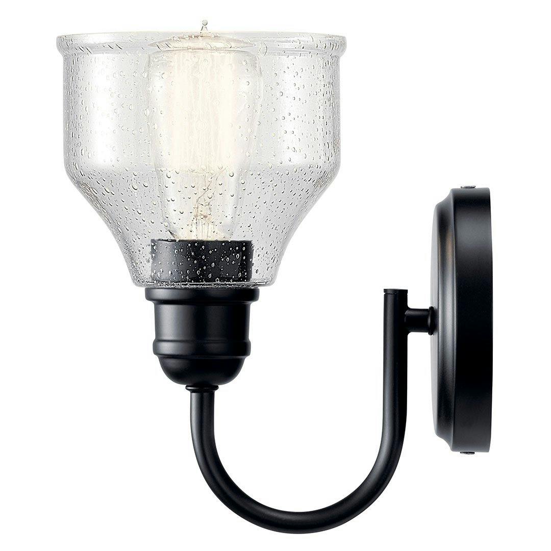 Profile view of the Avery 9.5 Inch 1 Light Wall Sconce with Clear Seeded Glass in Black on a white background