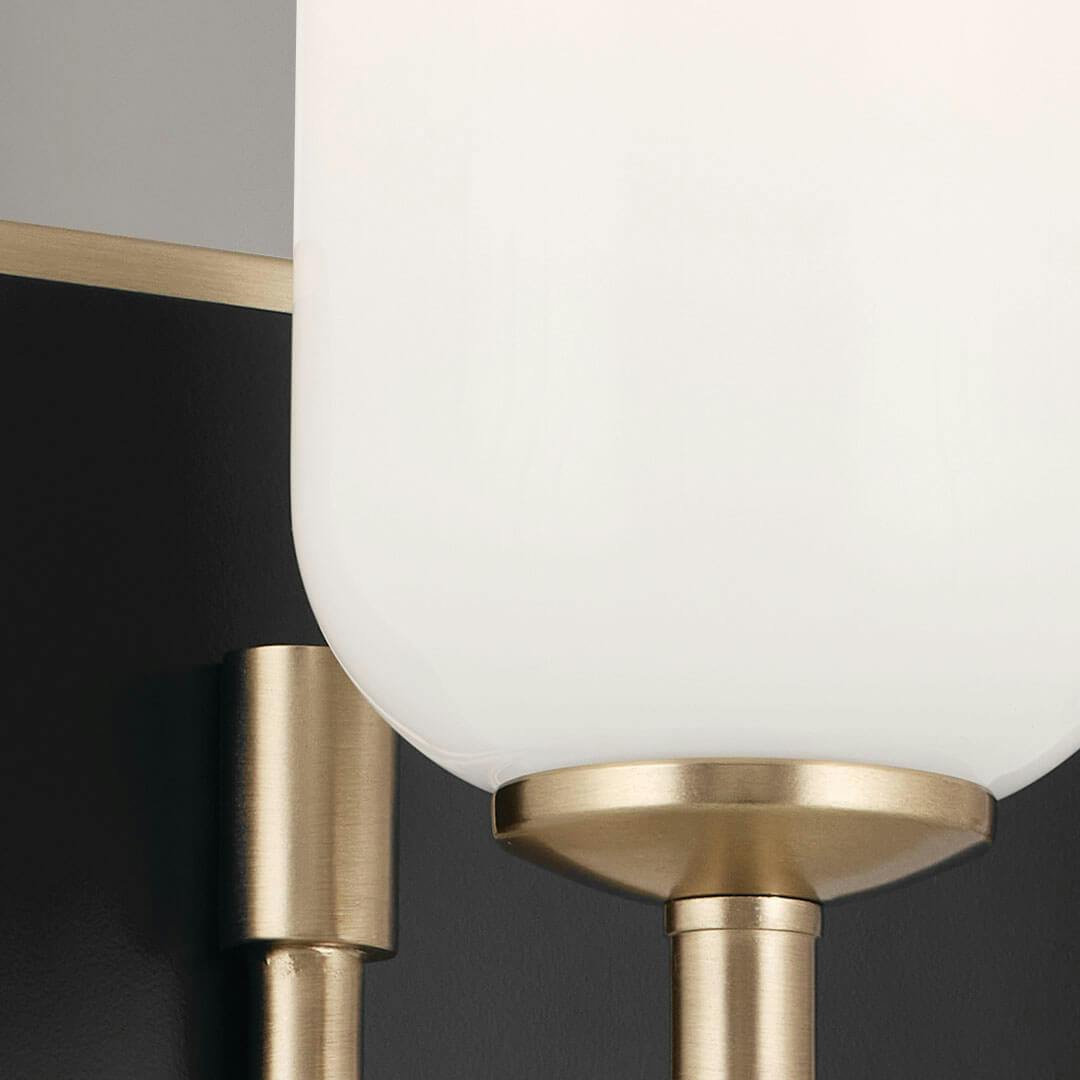 Close up of the Solia 32 Inch 4 Light Vanity with Opal Glass in Champagne Bronze with Black