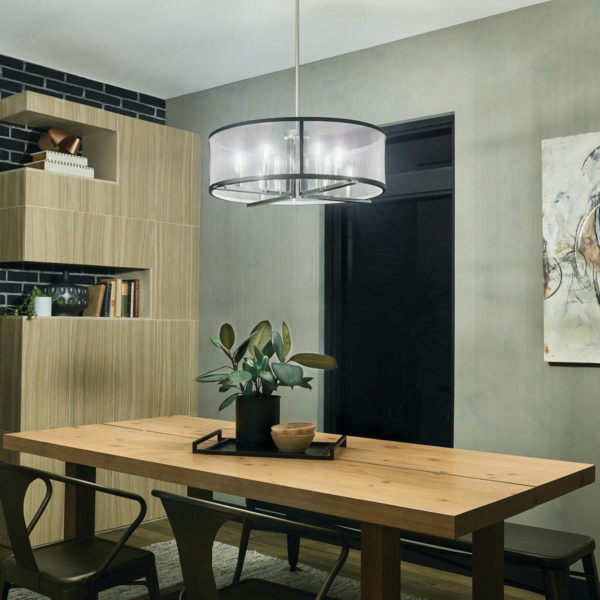 Night time dining room image featuring Titus chandelier 43715PN