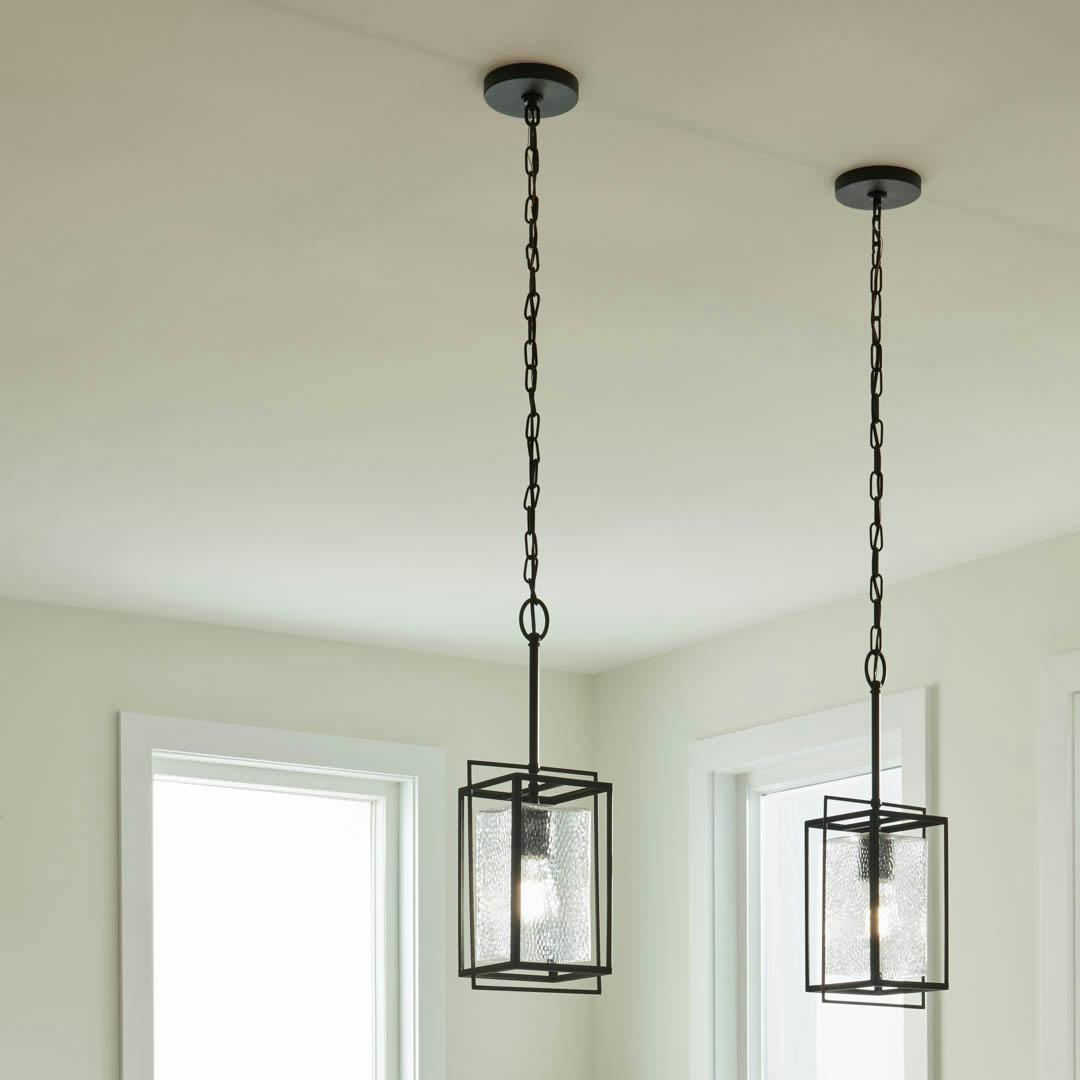 Day time kitchen with Edinborough 1 Light Mini Pendant in Textured Black with Clear Hammered Glass