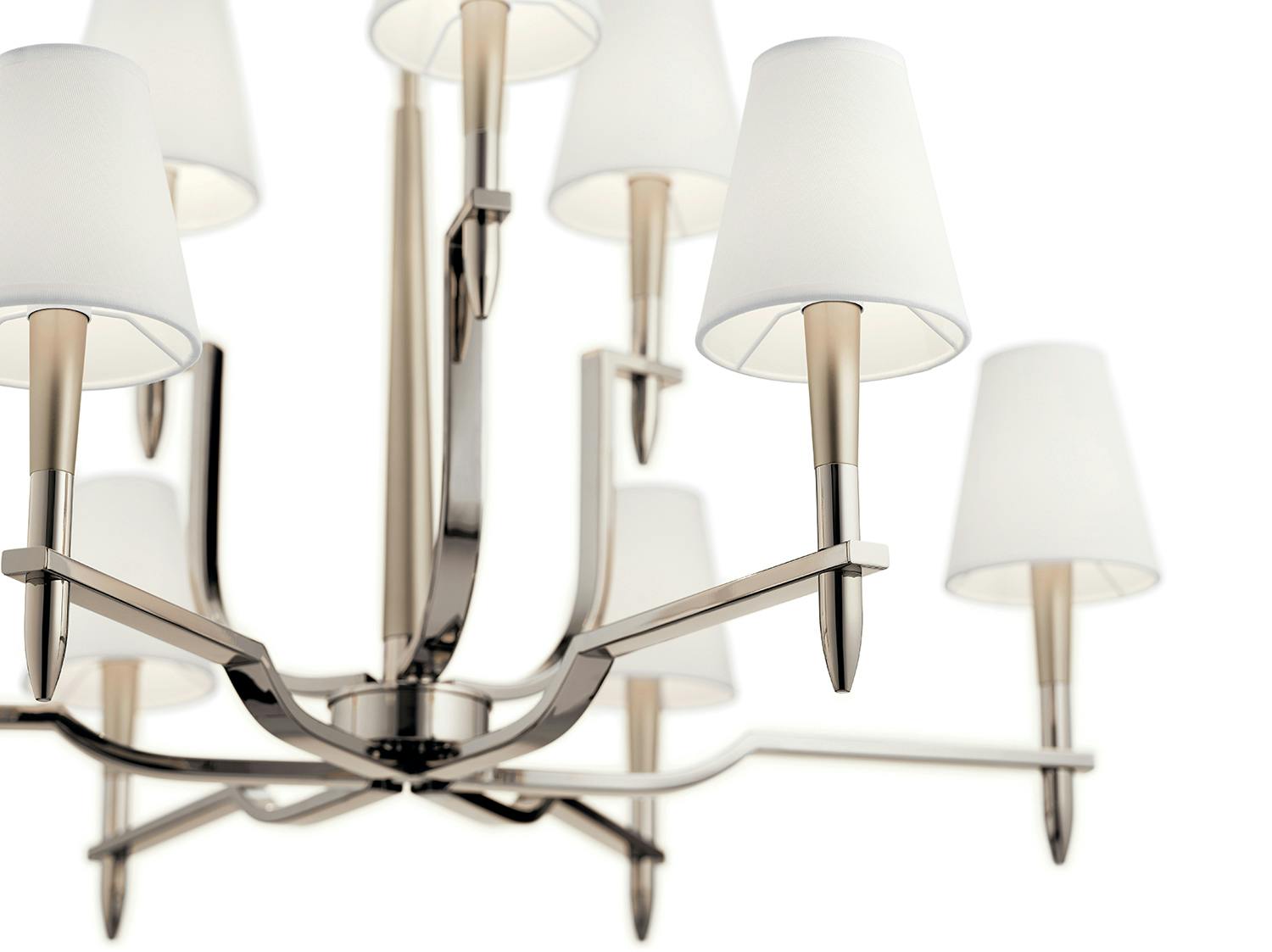 Close up view of the Kinsey 9 Light Chandelier Polished Nickel on a white background