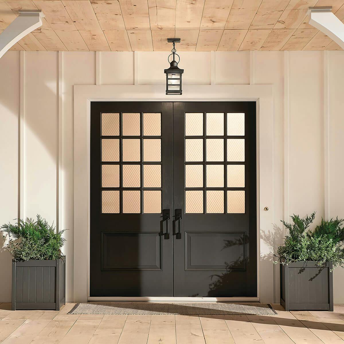 Day time outdoor entryway image featuring Grand Ridge pendant 39538