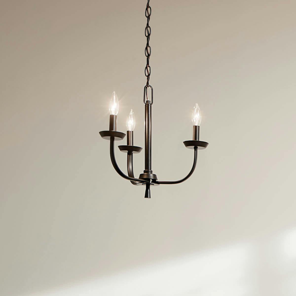 Day time dining room with Kennewick™ 3 Light Chandelier Black