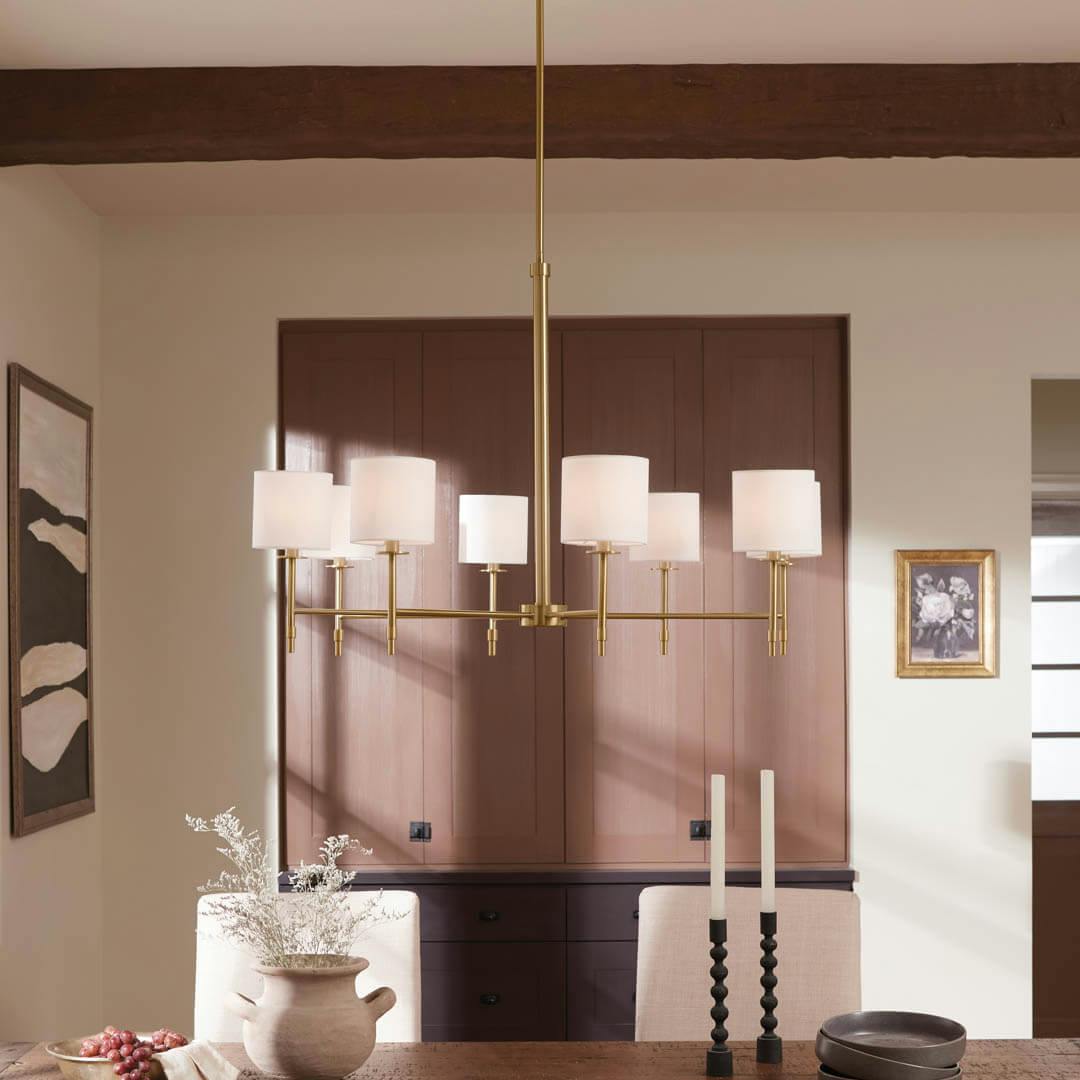 Day time dining room with Ali 38.5" 8 Light Chandelier Brushed Natural Brass