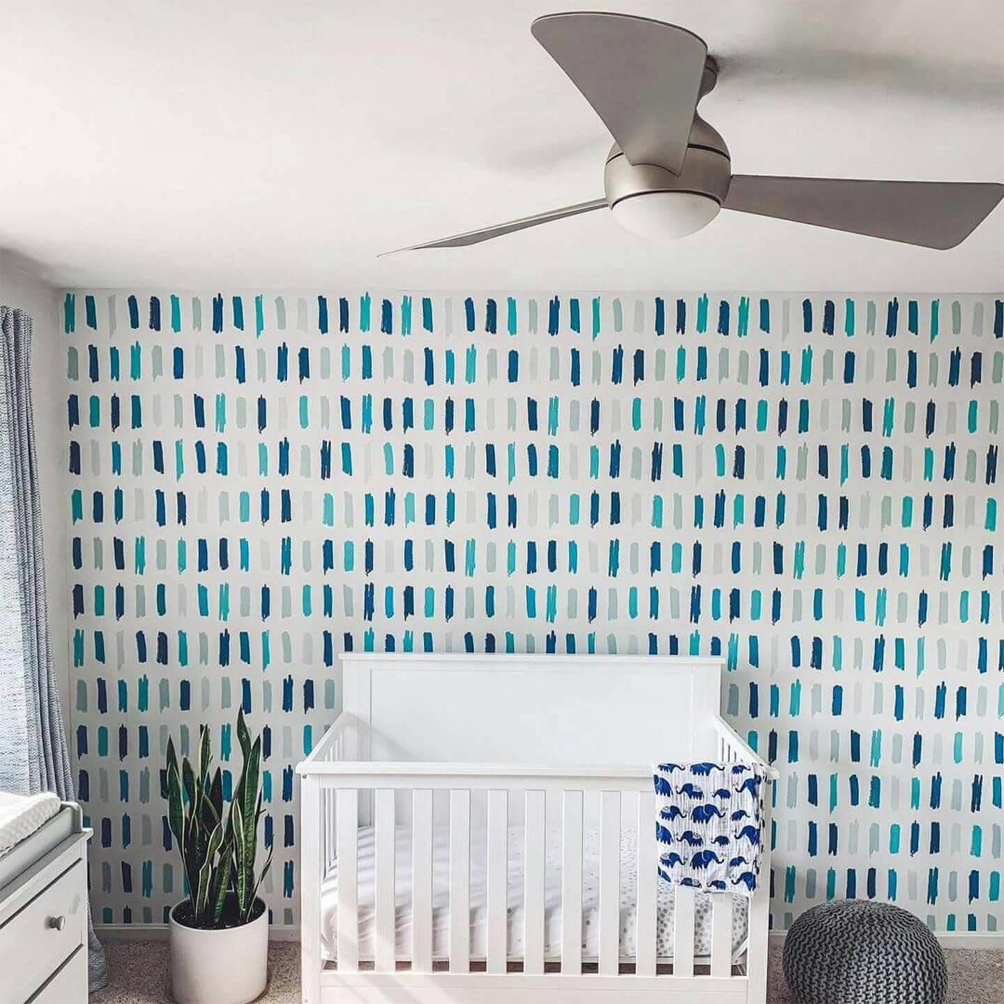 Child's room with Kichler ceiling fan and crib