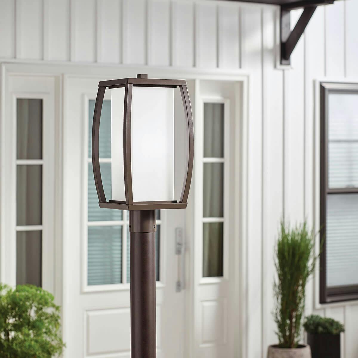 Day time outdoor image featuring Bowen post light 49342AZ