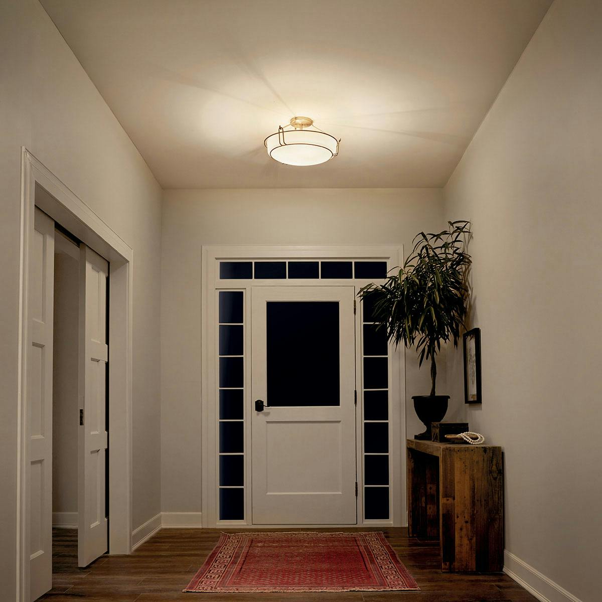 Night time Hallway image featuring Alkire flush mount light 44086NI