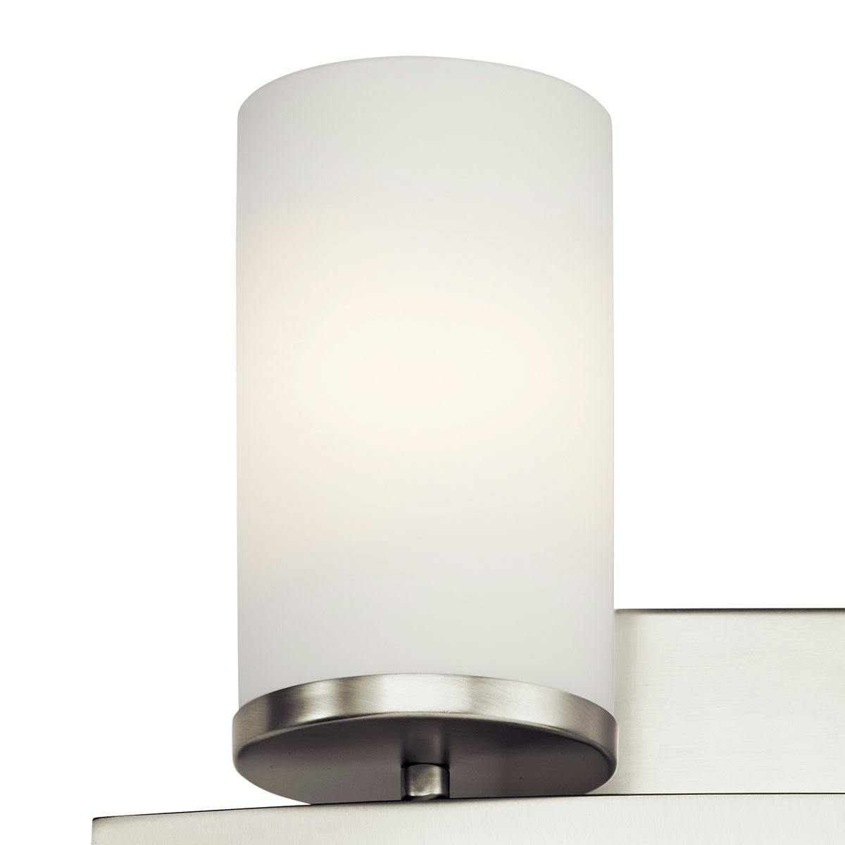 Close up view of the Crosby 15"  Vanity Light Brushed Nickel on a white background