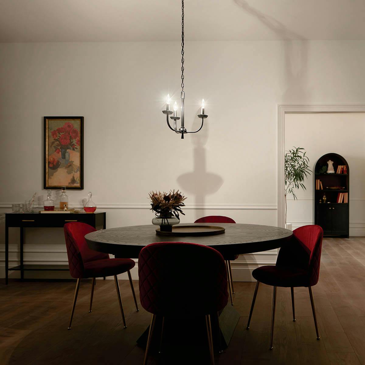 Night time dining room with Kennewick™ 3 Light Chandelier Black
