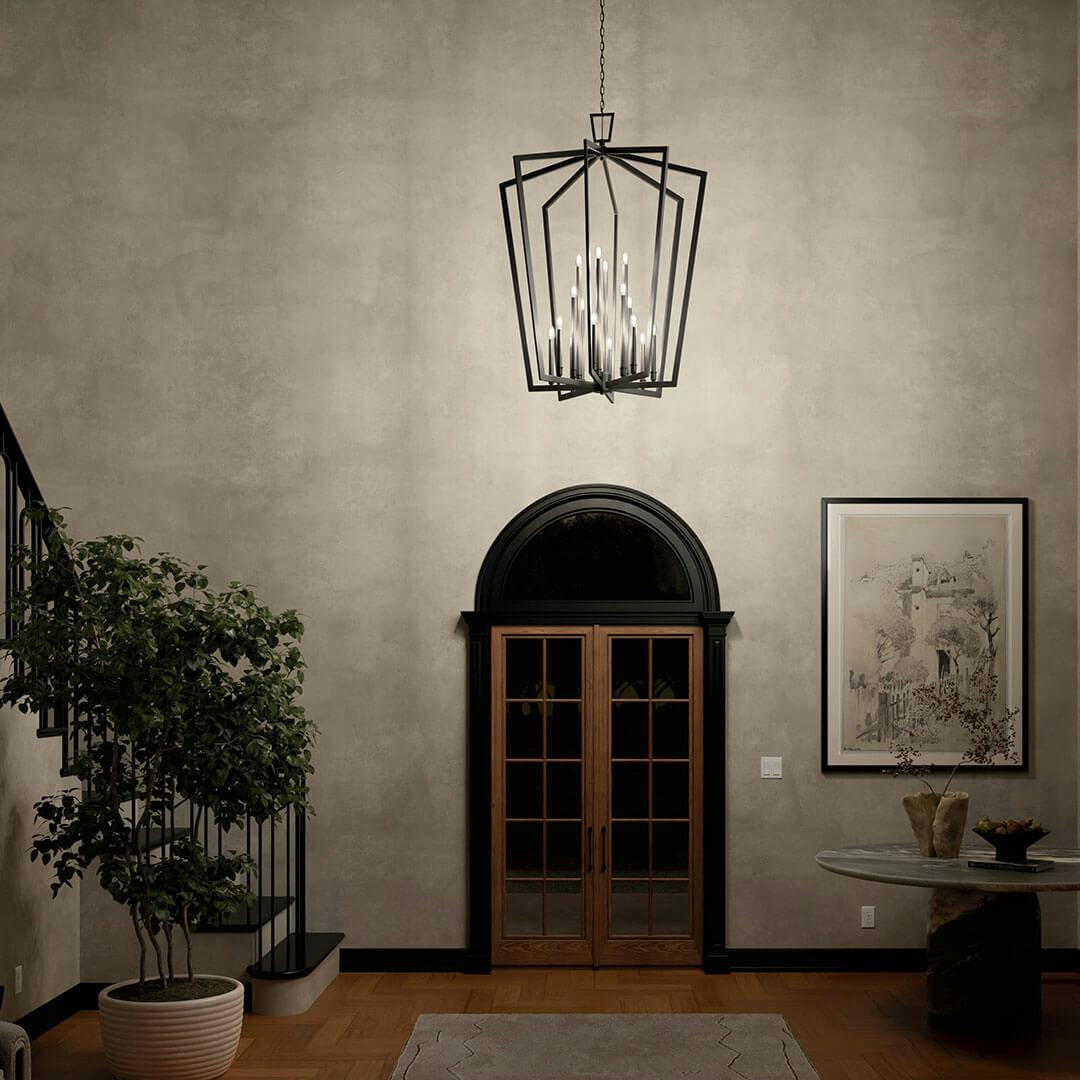 Foyer at night with the Abbotswell 49 Inch 16 Light Foyer Pendant in Black