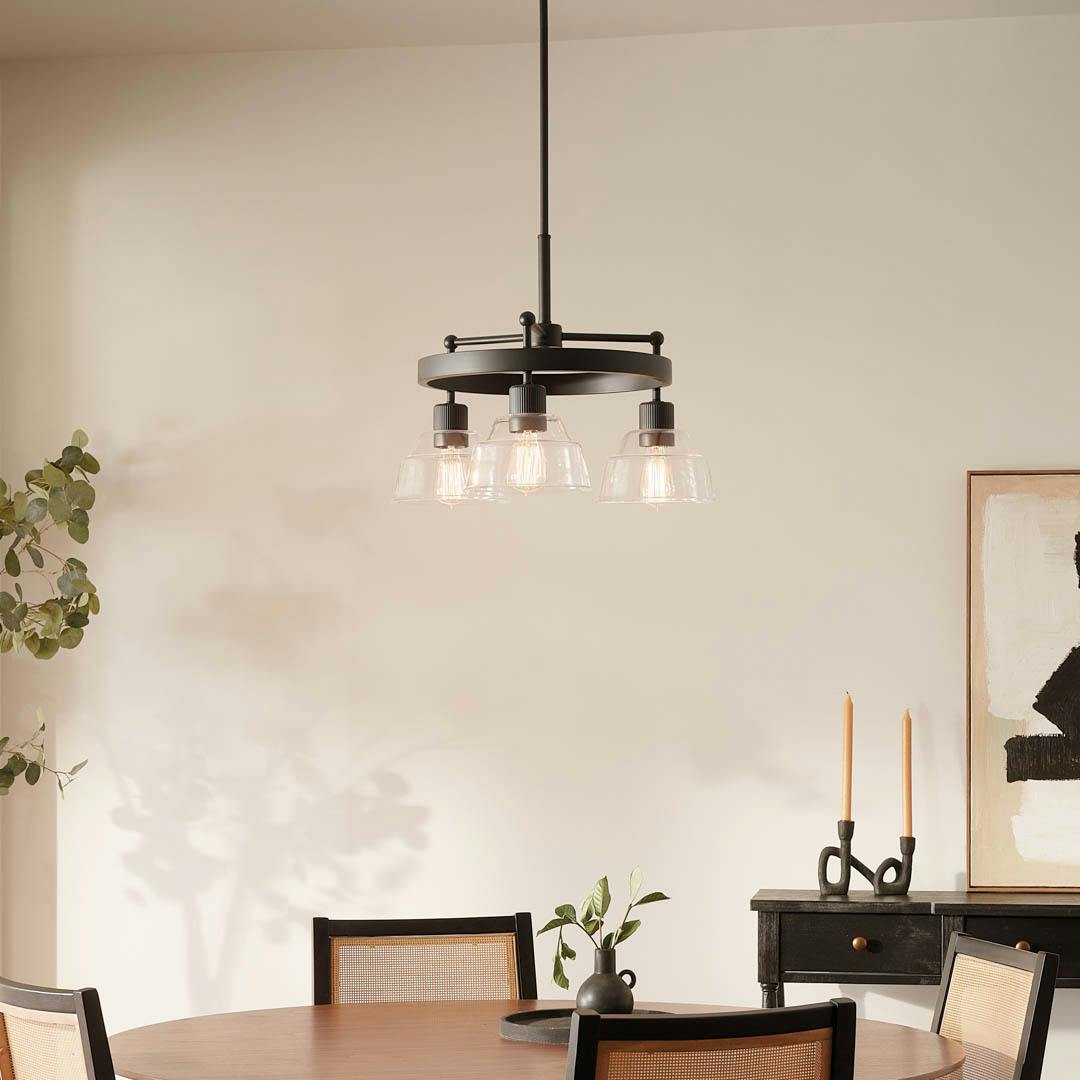 Day time dining room with Eastmont™ 3 Light Chandelier Black  and Walnut Wood
