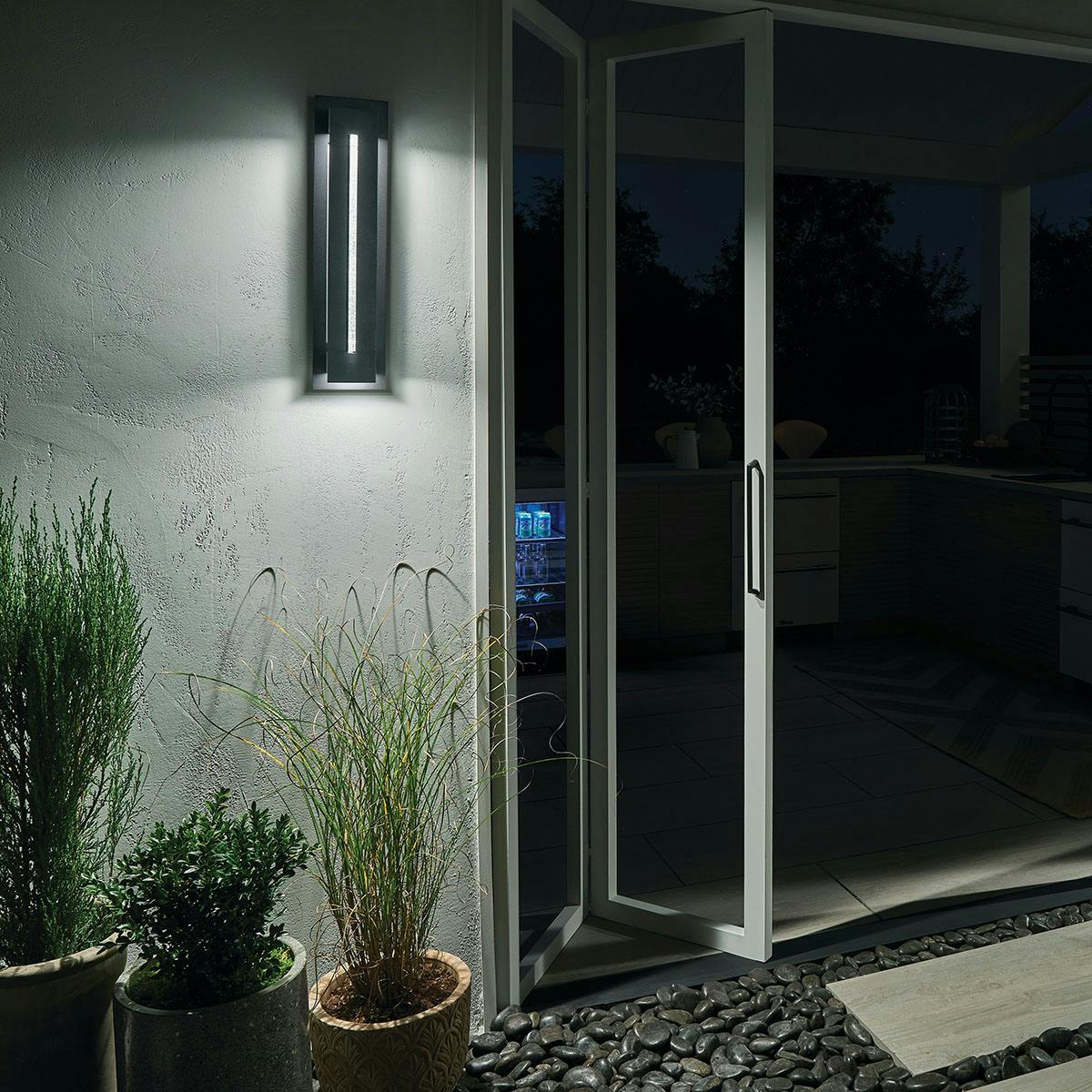 Night time Exterior image featuring River Path outdoor wall light 49946BKTLED
