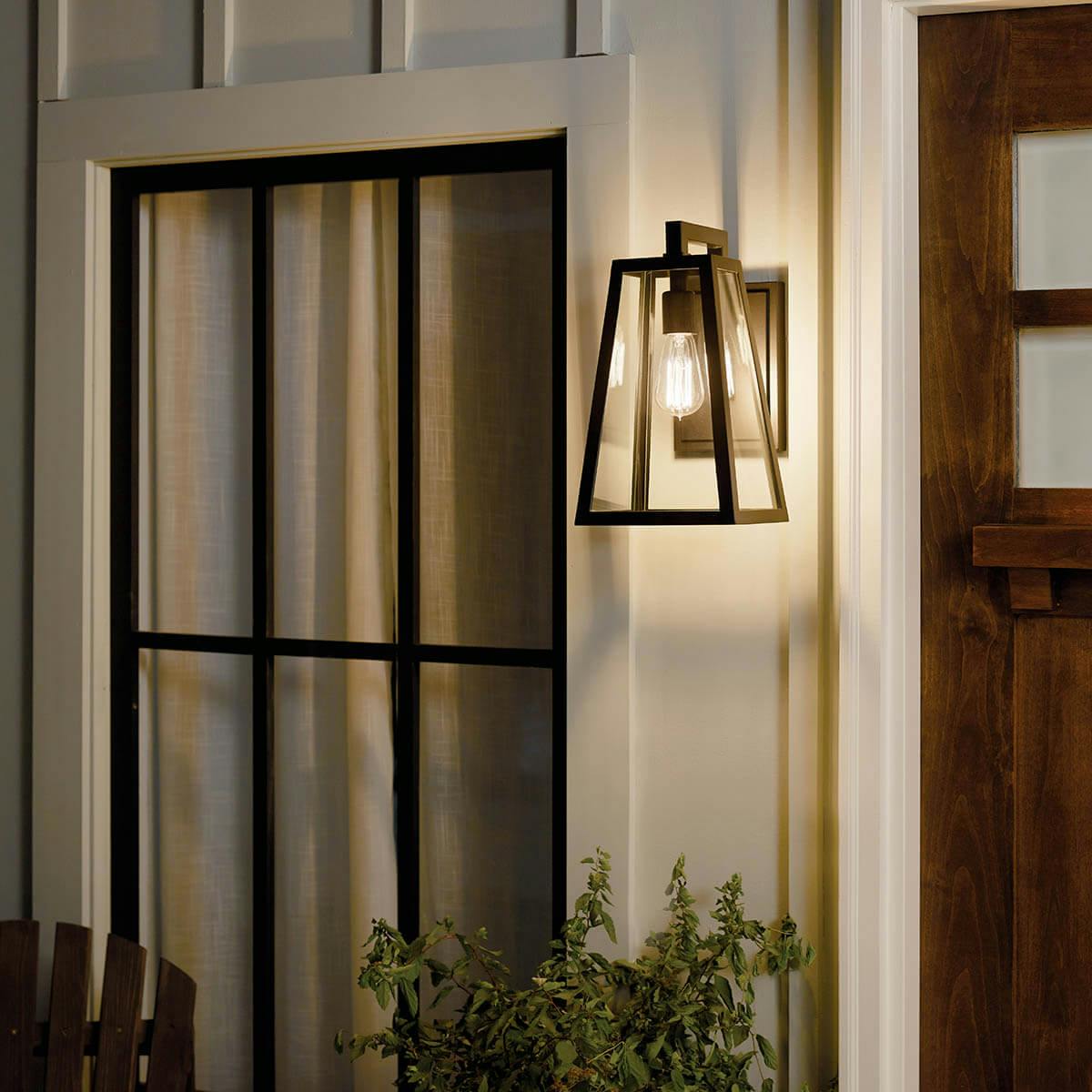 Night time porch with Delison 14" 1 Light Wall Light Black