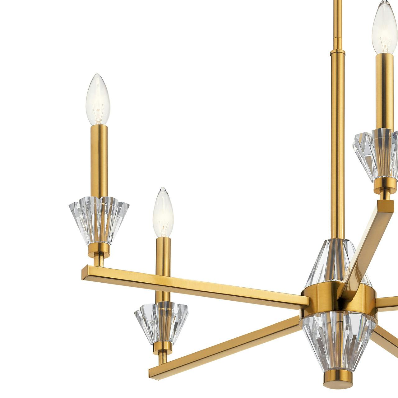 Close up view of the Calyssa™ 5 Light Chandelier Fox Gold on a white background