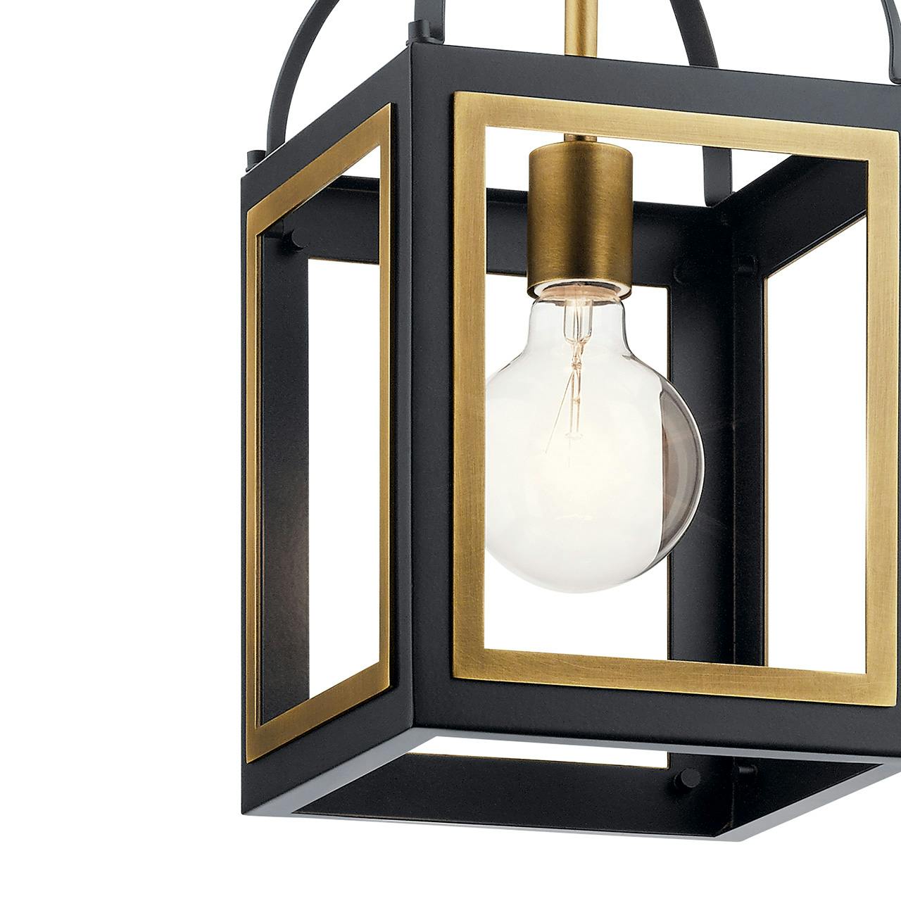 Close up view of the Vath 8" 1 Light Pendant Black & Brass on a white background