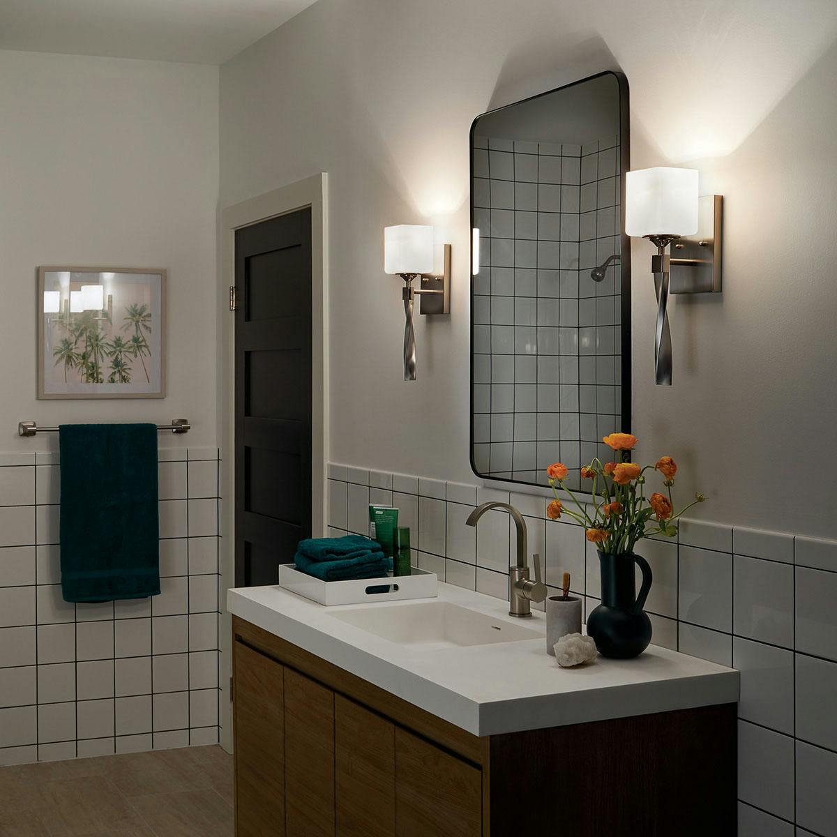 Night time Bathroom featuring Marette vanity light 55000NI