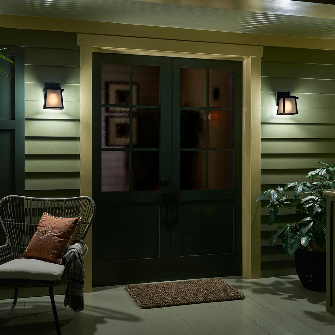 Night time Exterior with Noward 9" 1 Light Wall Light Black