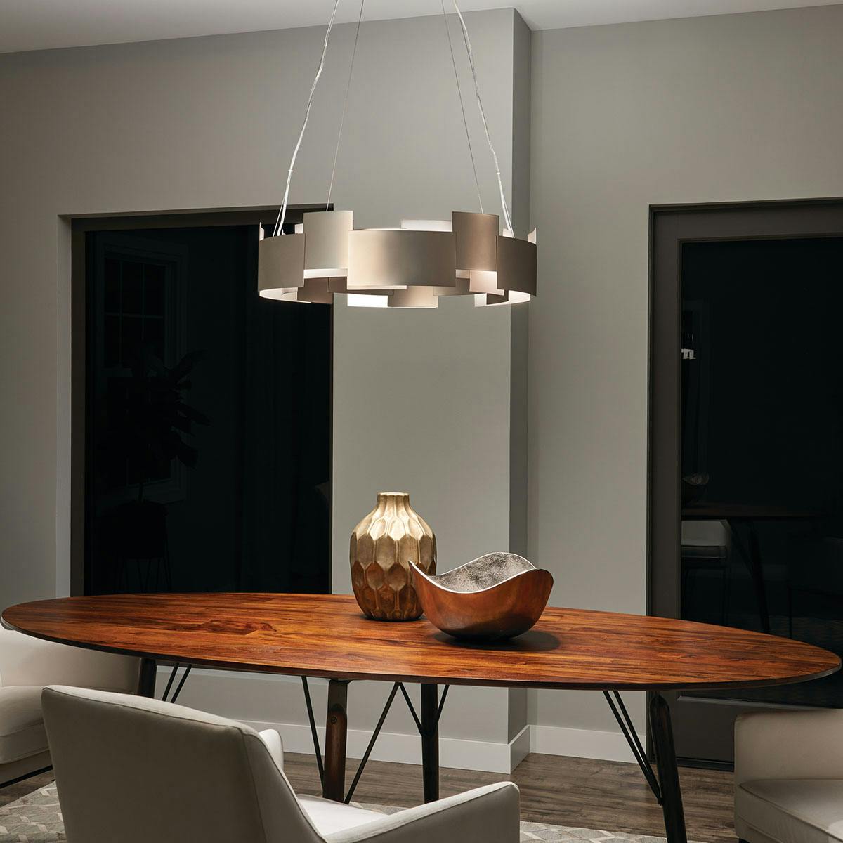 Night time dining room image featuring Moderne pendant 42992SNLED