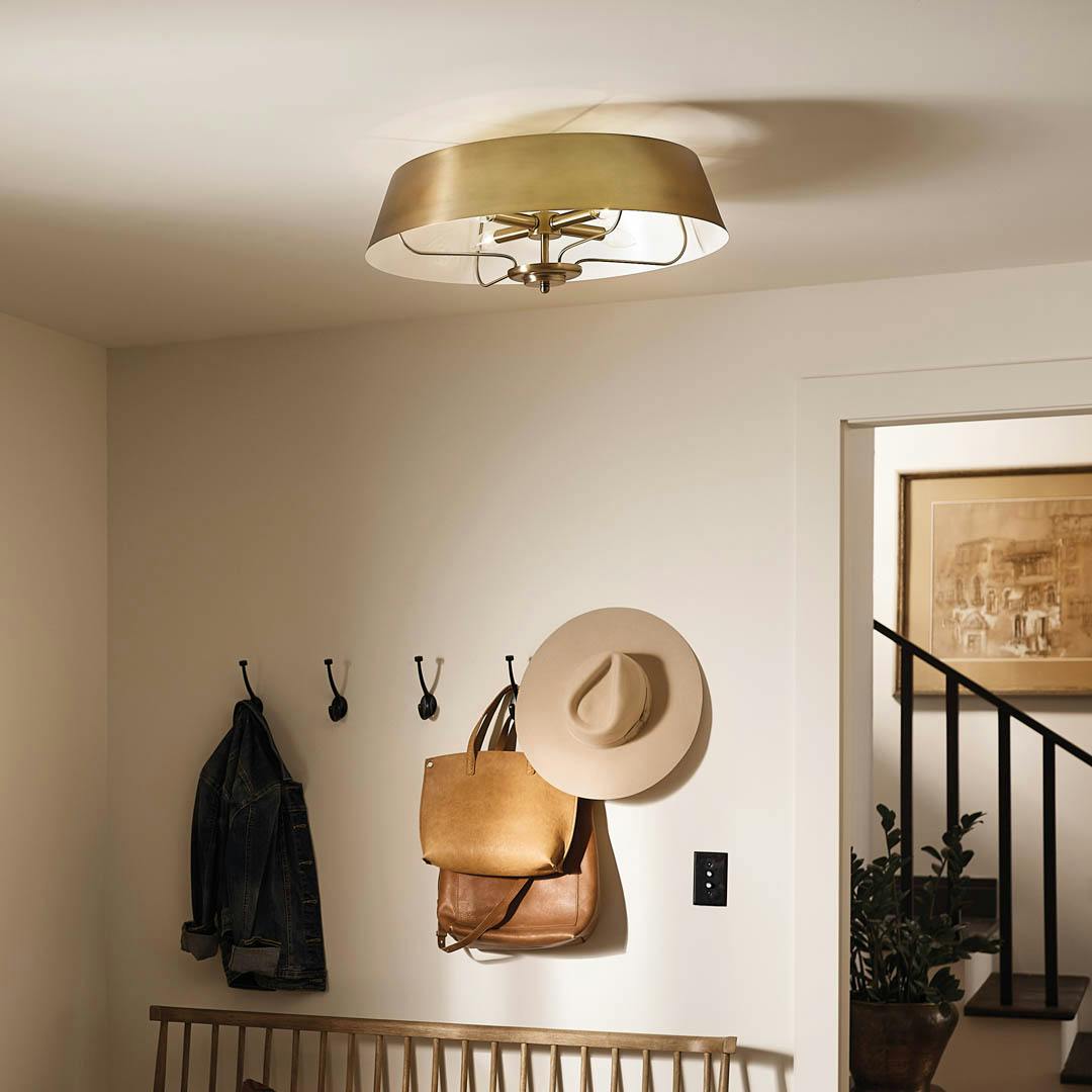 Day time entryway with Luella 22" 4 Light Pendant Brushed Natural Brass
