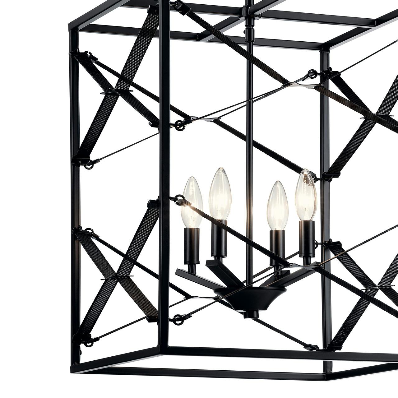 Close up view of the Sevan™ 4 Light Foyer Pendant Black on a white background