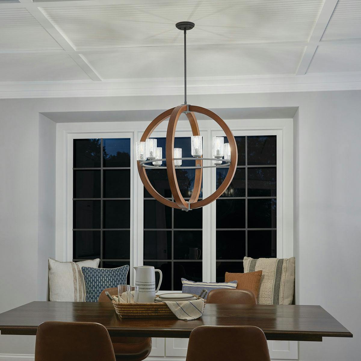 Night time dining room image featuring GrandBank chandelier 43190AUB