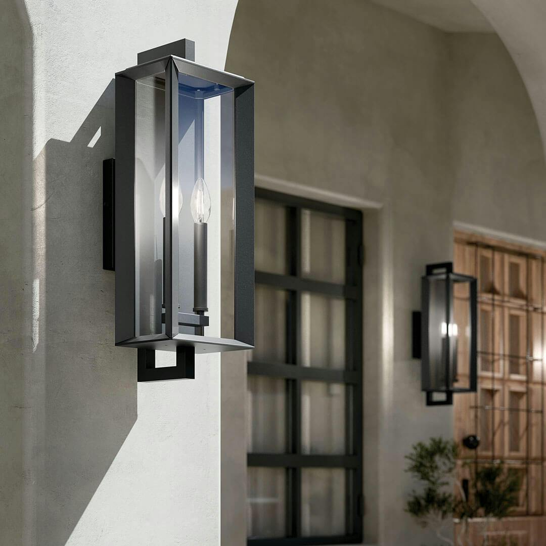 Exterior house with the Kroft 28" 2 Light Outdoor Wall Light with Clear Glass in Textured Black