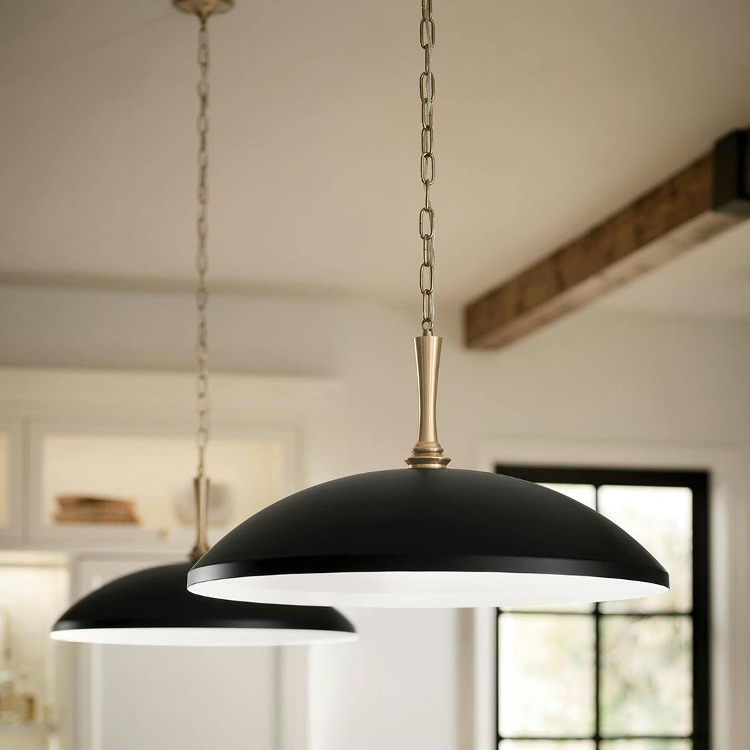 Kitchen in day light with the Delarosa 20 Inch 1 Light Pendant in Black and Champagne Bronze