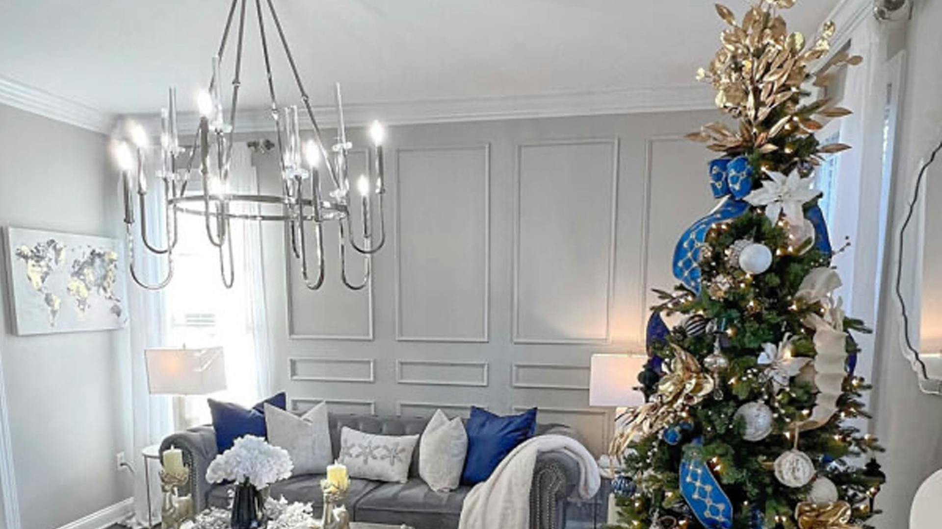 MojisStyle's Living room decorated for the holidays featuring a Kichler chandelier