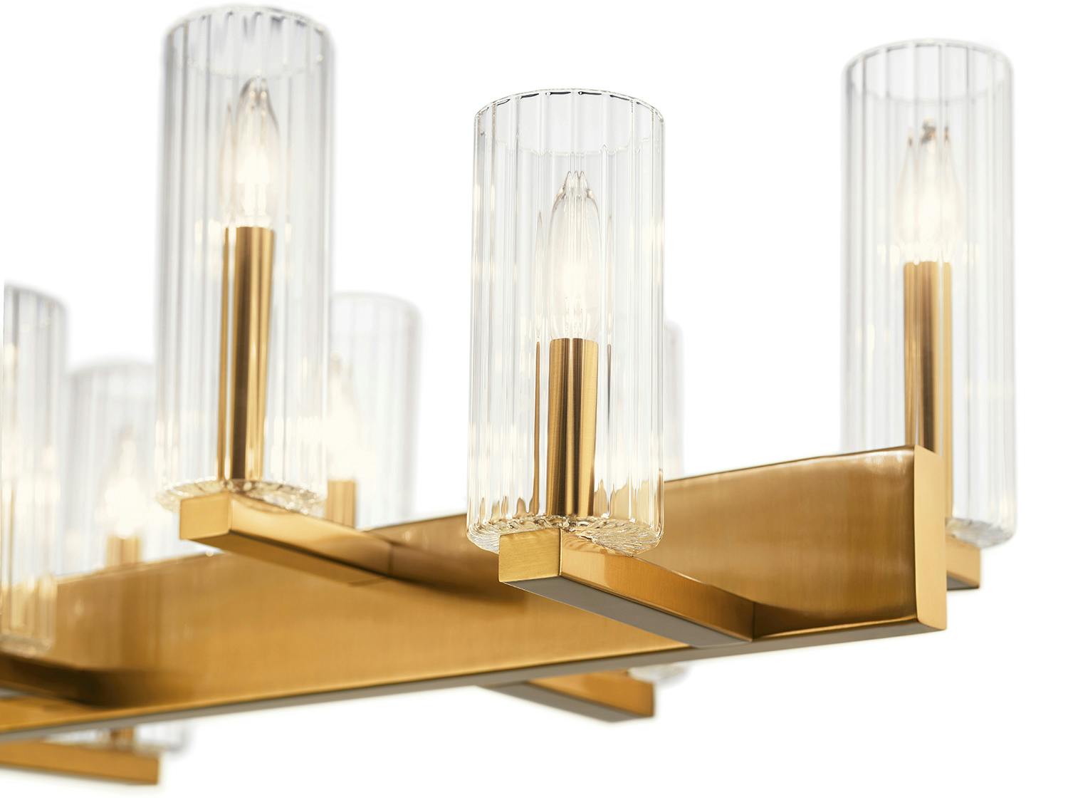 Close up view of the Cleara 14 Light Linear Chandelier Gold on a white background