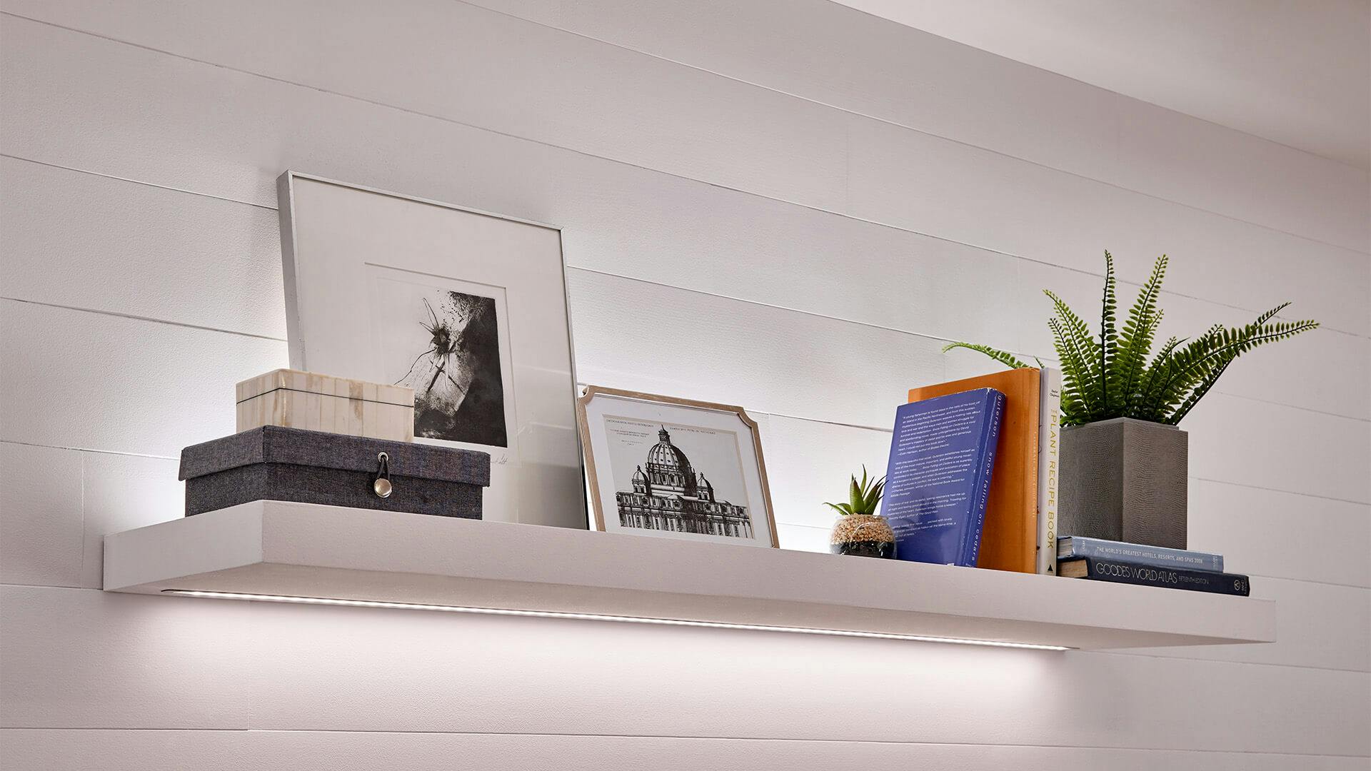 White shelf with tape lighting underneath