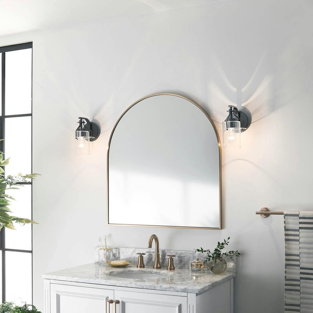 Day time bathroom with Everett™ 9.25" 1 Light Wall Sconce Black