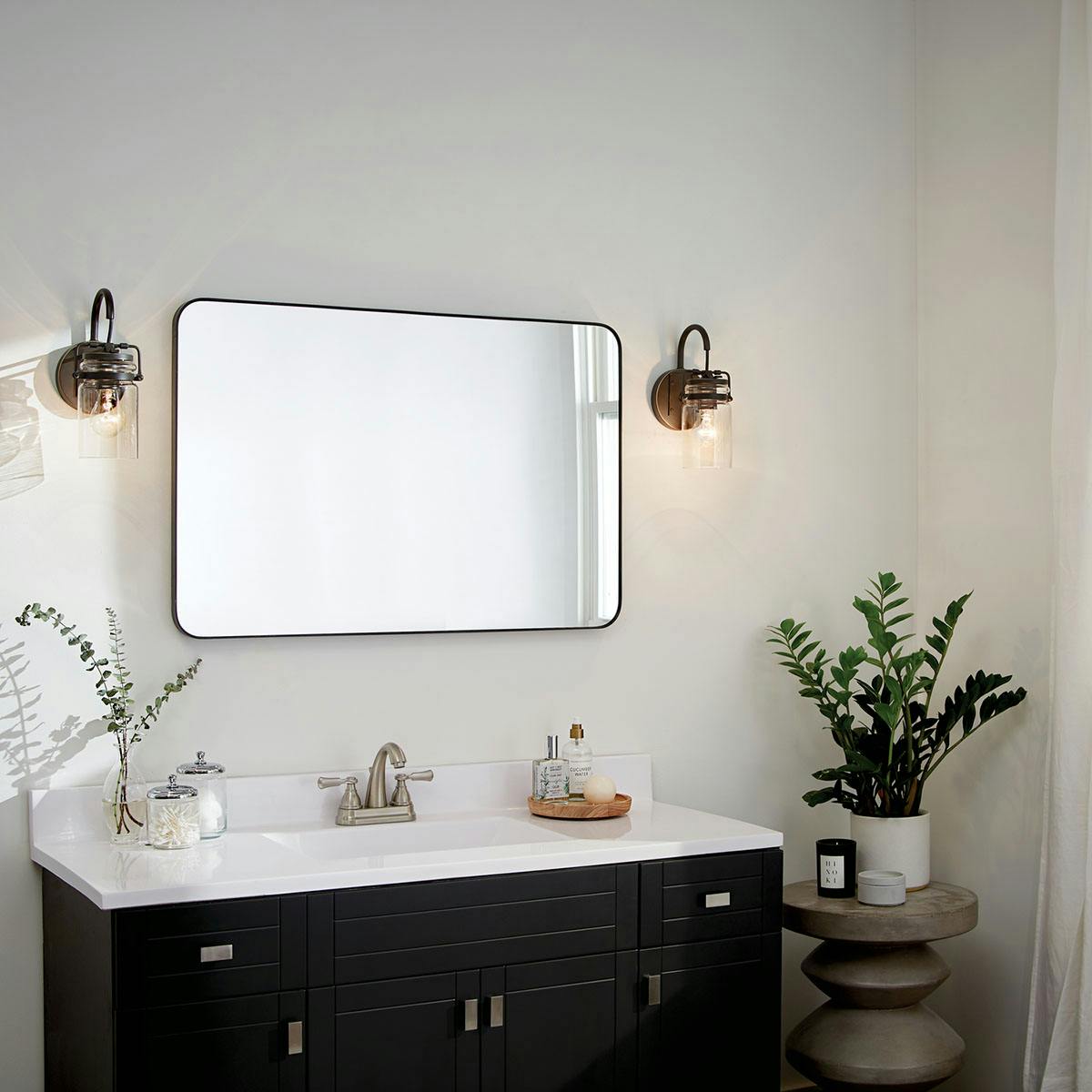 Day time Bathroom featuring Brinley vanity light 45576OZ