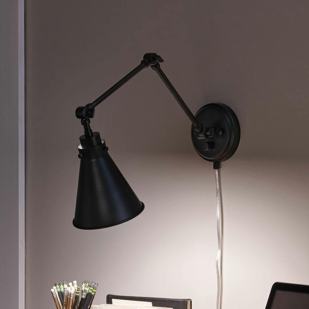Night time bedroom with Rosewood 20 Inch 1 Light Plug-In Wall Sconce in Matte Black 