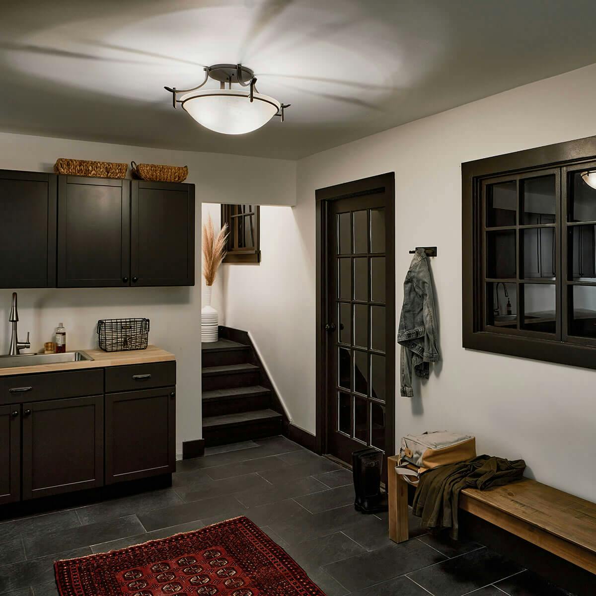 Night time mudroom featuring Olympia 3606OZ