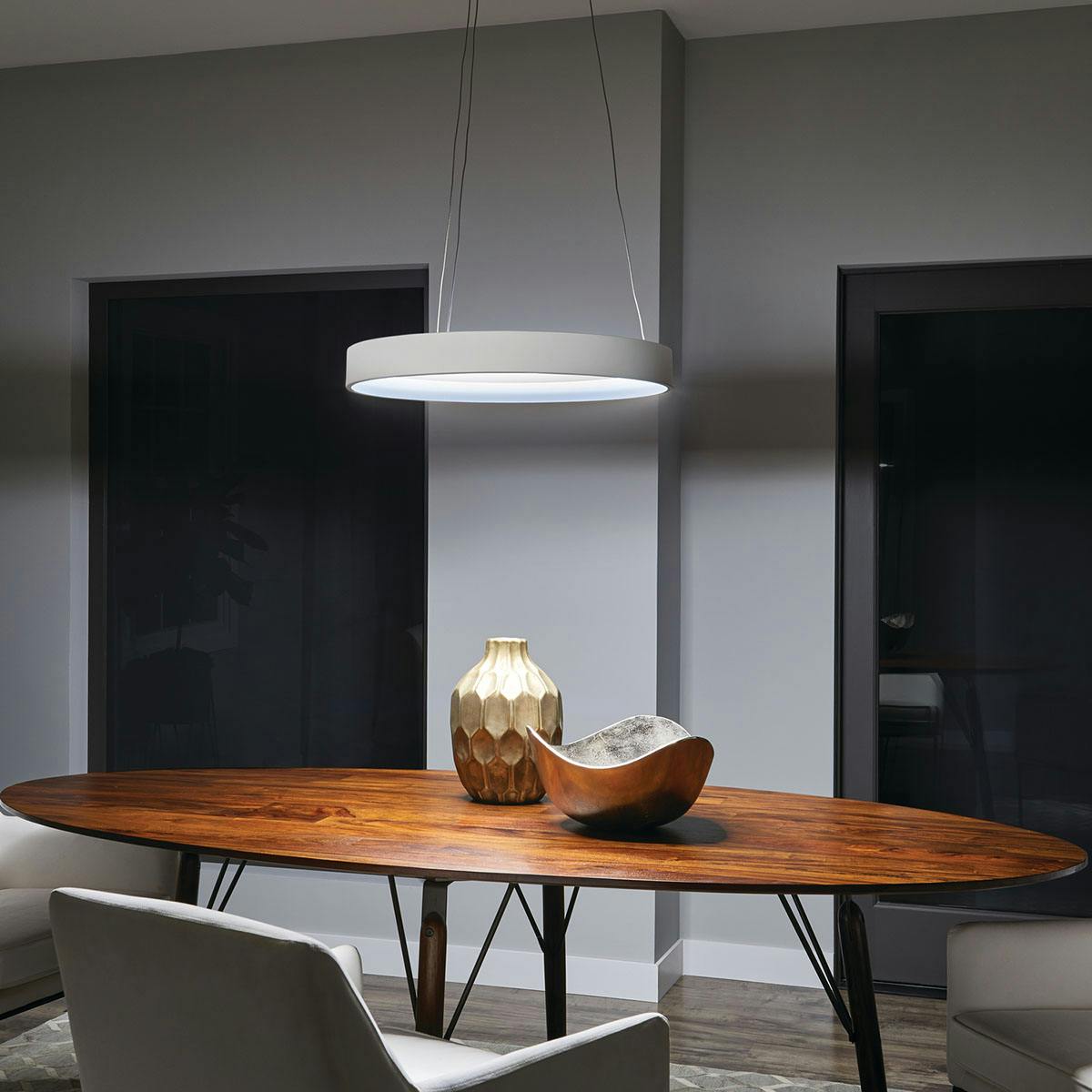 Night time dining room image featuring Fornello pendant 83454