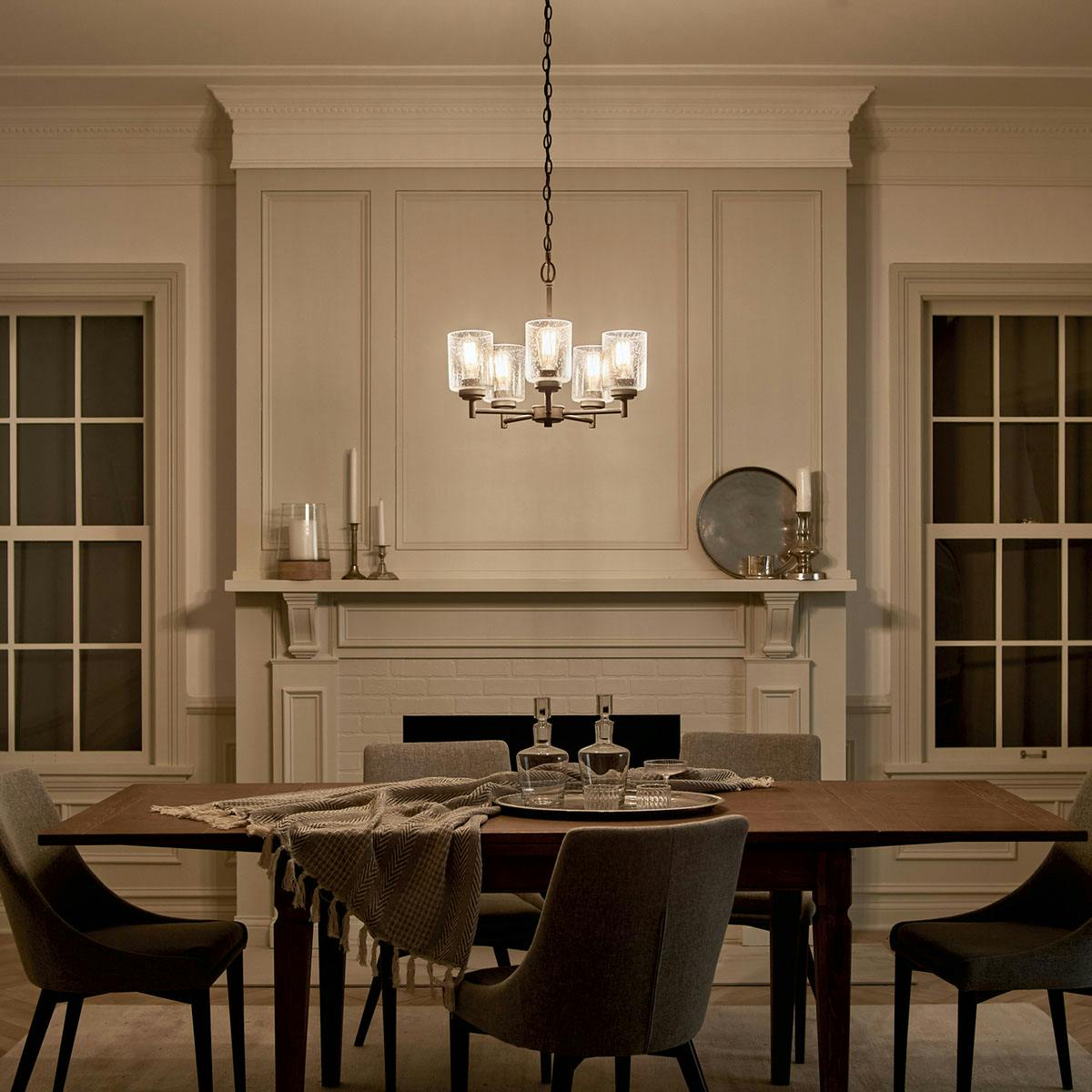 Night time dining room image featuring Winslow chandelier 44030BK