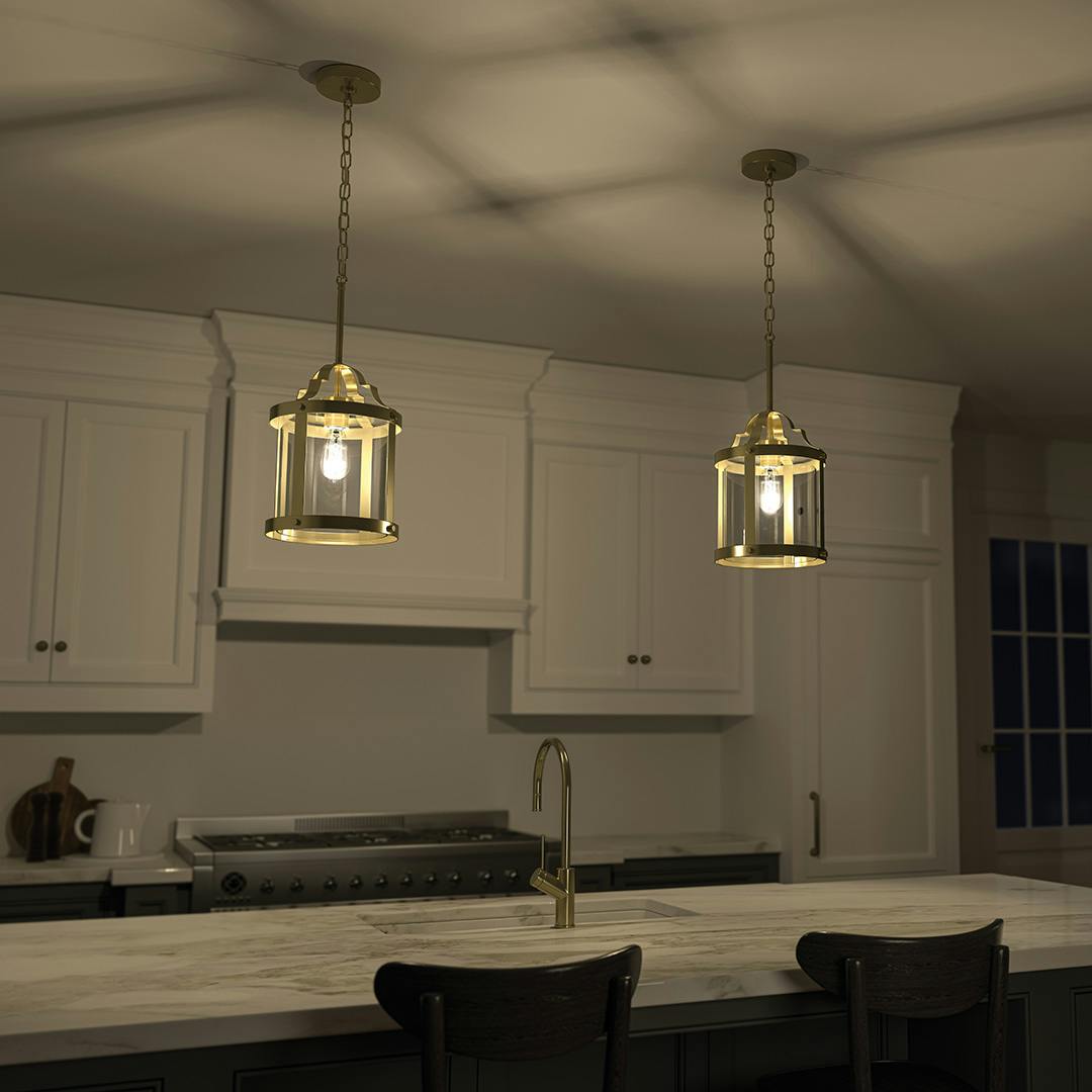 Night time view of the Farona 10.5" 1 Light Pendant Classic Gold