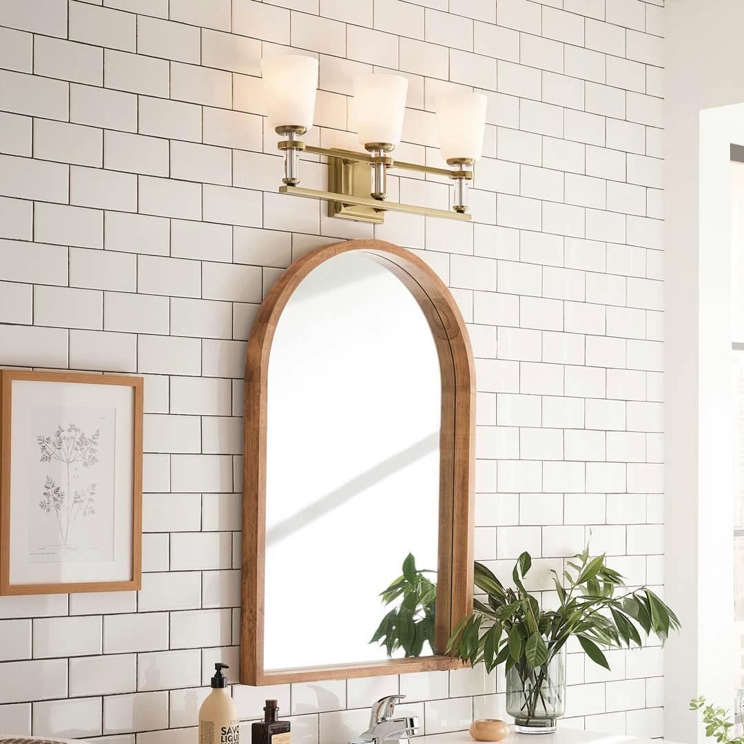 Day time bathroom with Rosalind 11.5" 3 Light Vanity Light Brushed Natural Brass