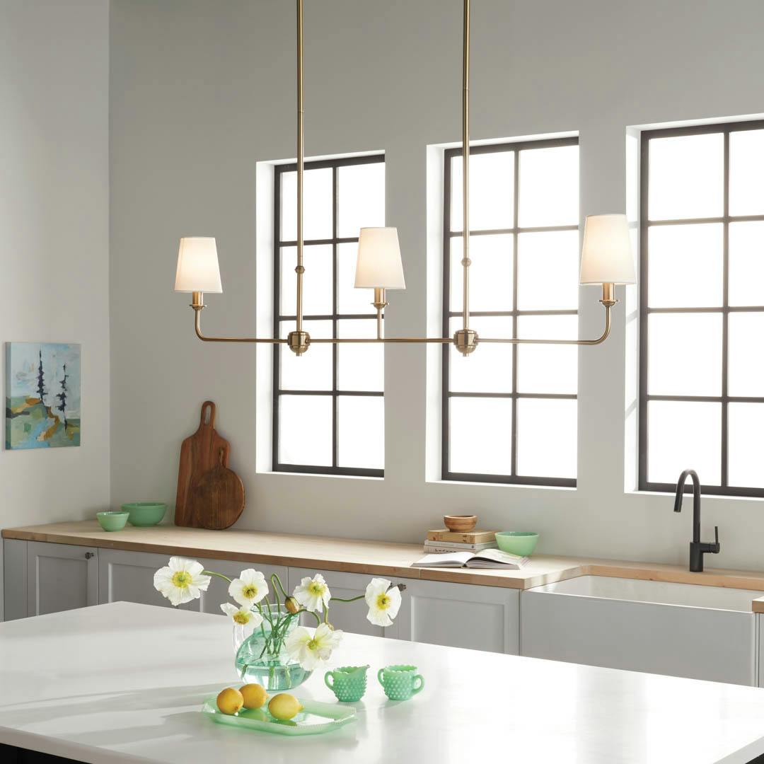 Day time kitchen with Pallas 48.25" 3 Light Linear Chandelier Brushed Natural Brass