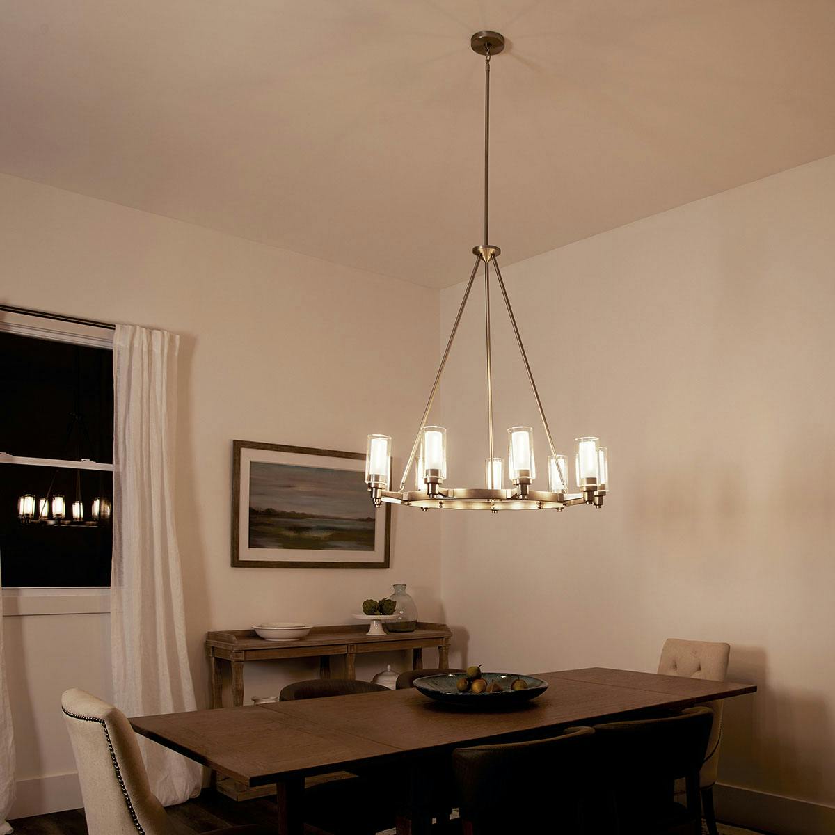 Night time dining room image featuring Circolo chandelier 2346NI