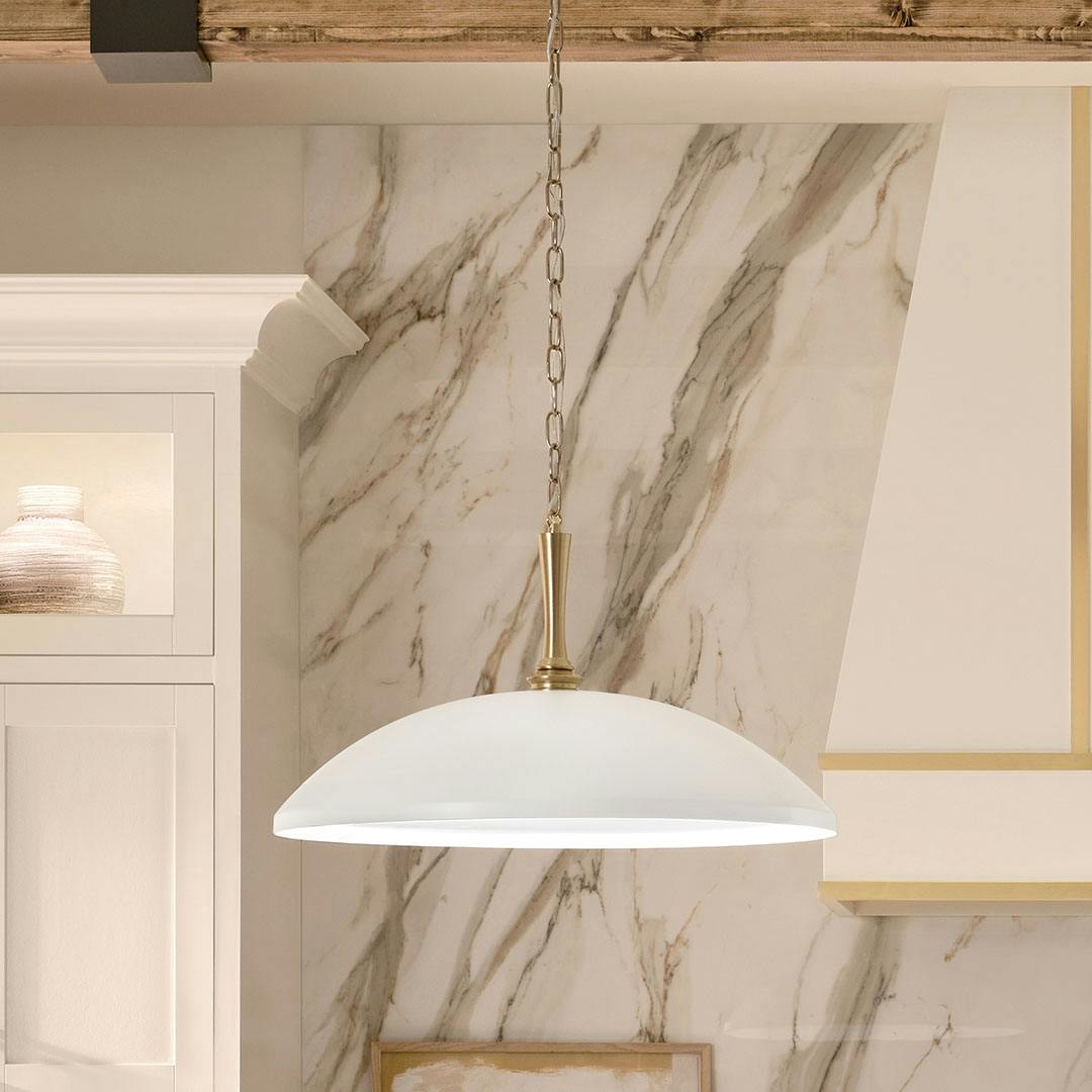 Kitchen in day light with the Delarosa 20 Inch 1 Light Pendant in White and Champagne Bronze