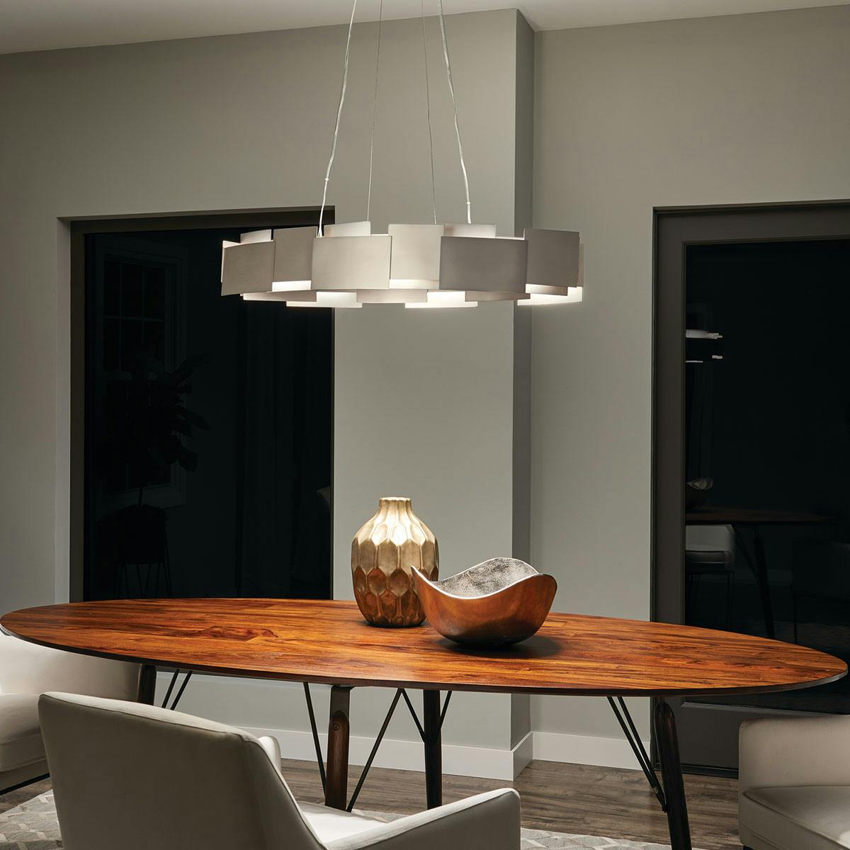 Night time dining room image featuring Moderne pendant 42993SNLED