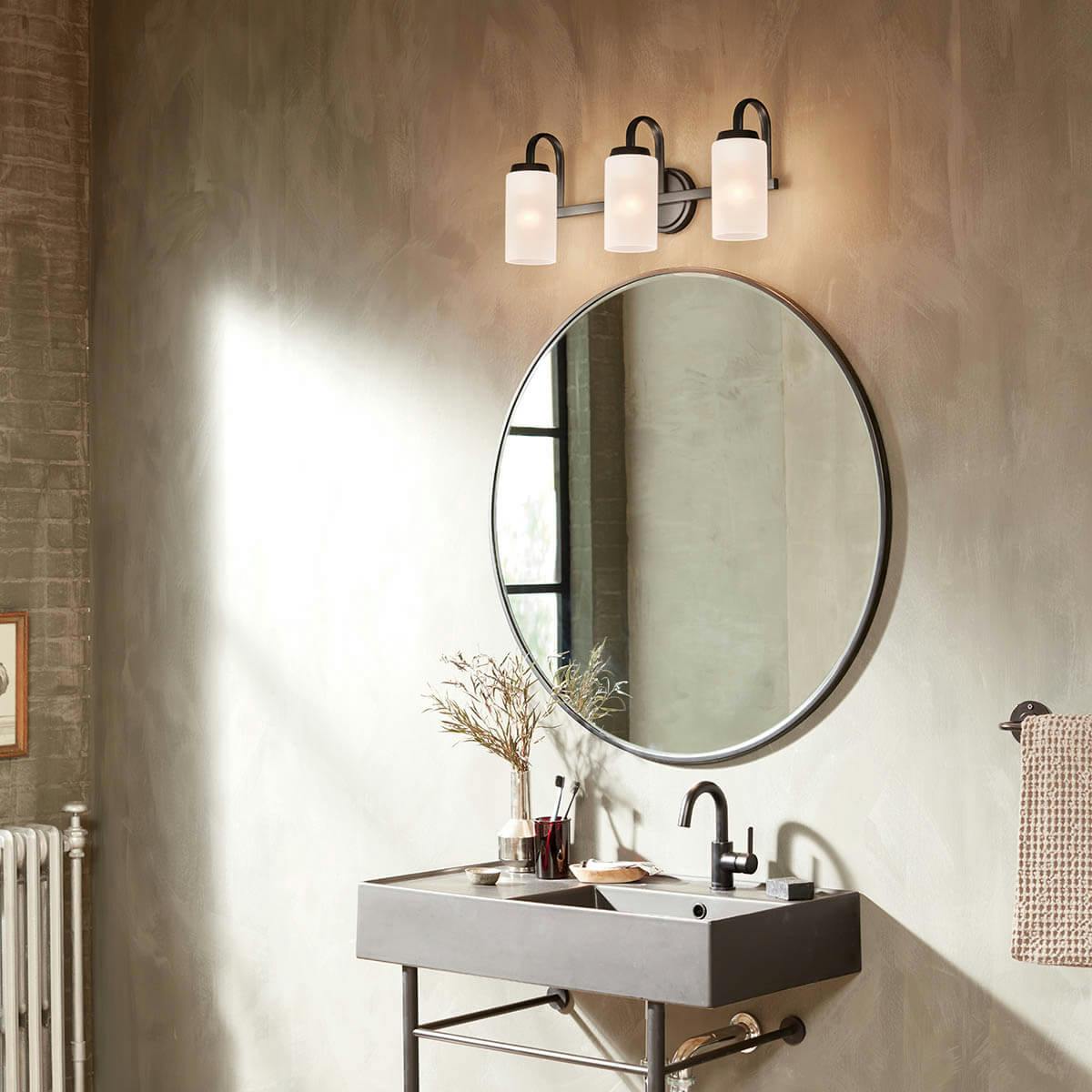 Day time bathroom with Kennewick 3 light vanity light in black