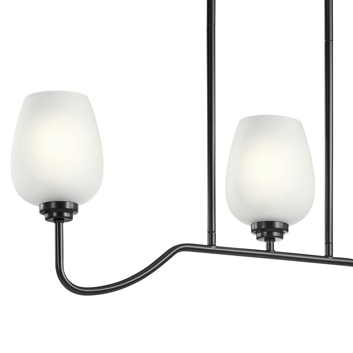 Close up view of the Valserrano™ 31"  Linear Chandelier Black on a white background